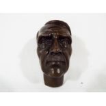 A bronze bust depicting Adolf Hitler,