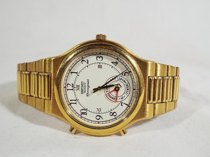 A Seiko Quartz Chronograph alarm wristwatch in a gold anodised finish,