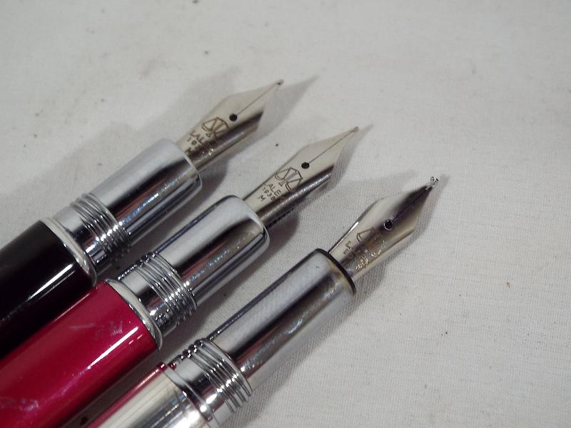 A collection of seven silver Lalex pens to include two miniature 1938, three fountain pens, - Image 2 of 2