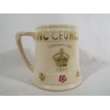 A Moorcroft Pottery Royal commemorative mug, George V Coronation 1911,