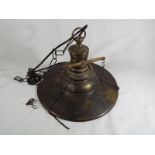 A brass converted gas electric ceiling light,