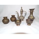 A group of Islamic / Arabic metal items to include an urn,