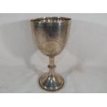 A Victorian silver hallmarked communion goblet, Birmingham assay 1899, 21cm (h),