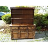 A carved oak dresser,