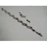 A lady's hallmarked 9ct white gold bracelet, (a/f), approximate weight 6.