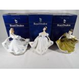 Three Royal Doulton Lady figurines comprising Lynne HN 2329, Kate HN 2789 and Cathy HN 3305,