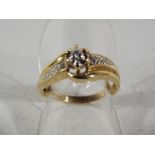 A lady's 9ct gold ring set with diamonds, size O, approximate weight, 2.