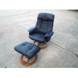 A good quality leather swivel chair on wooden circular base with footstool