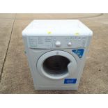 An Indesit washing machine,