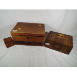 A collection of wooden boxes and chests to include an inlaid box with single hinge, felt lined,