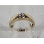 A lady's 9ct gold ring set with a cluster of four diamonds, size N1/2, approximate weight, 3.