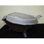 A French cast iron boudoir carboniere coal scuttle / bucket of oval form with hinged lid decorated