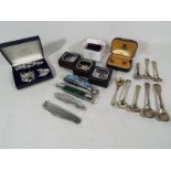 A mixed lot to include a pair of lady's clip-on 9ct gold earrings set with amethyst and cultured