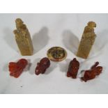 A Chinese hard stone collection to include a pair of soap stone seals,