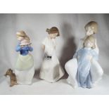 Three Nao by Lladro figures depicting girls,