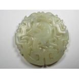 A pierced carved hard stone pale celadon jade pendant 5.5 cm (dia) - Est £30 - £50