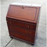 A good quality mahogany writing bureau, opening to reveal a fitted interior,