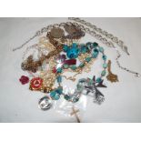 A small collection of costume jewellery to include a cannon matching necklace and bracelet set,
