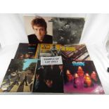 A collection of record albums and singles to include, The who,