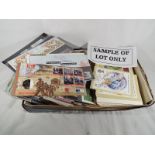 A large collection of UK first day covers and approximately 40 postcards - £20 - £40