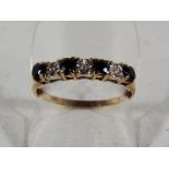 A lady's 9ct gold sapphire and diamond ring, size R1/2, approximate weight 1.