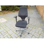 A black adjustable office chair