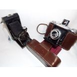 Two vintage cameras to include an Ensign Selfix 12 - 20 Epsilion No 17708 in brown leather