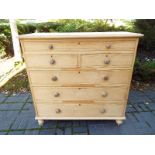 A set of late 19th / early 20th century pine drawers with bun handles,