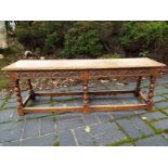 A period carved oak bench seat, 41 cm x 122 cm x 30.