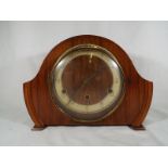 A mahogany cased mantel clock, Arabic numerals on a silvered chapter ring marked Andrew,