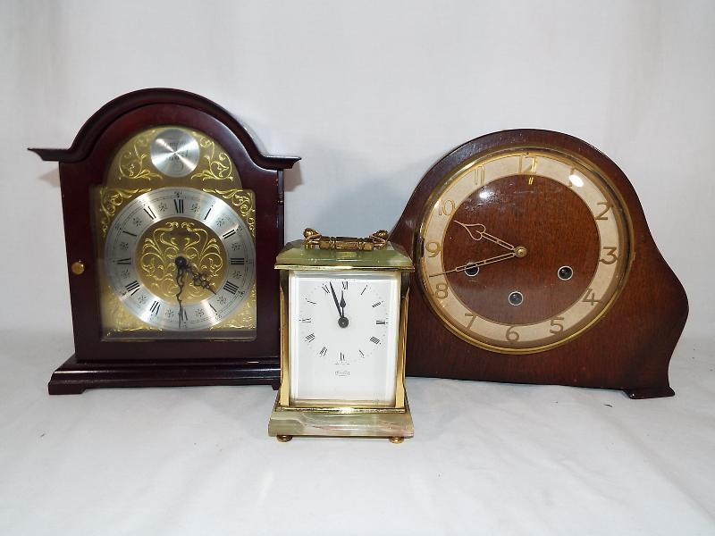 A Tempora onyx mantel clock,