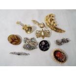A collection of good quality costume jewellery to include two silver brooches,
