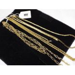 A collection of three sets of Pierre Cardin designer yellow metal necklaces with matching bracelet,