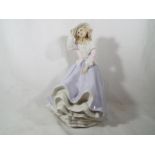 A Royal Doulton Reflections figurine entitled Free as the Wind,