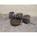 A set of Meyer Tensl cooking pans to include a large casserole pot, skillet and other,