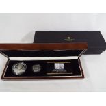A Diamond Jubilee of Two Queens 1897 & 2012 commemorative set of two silver proof coins,