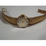 A lady's 9 carat gold Bulova wristwatch, case weight 23g, assay marks to the case for London
 1967,