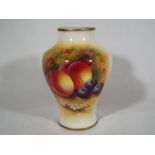 A Royal Worcester small vase hand-painted with 'Fallen Fruits', signed Ayrton, shape no. 2491, 10.