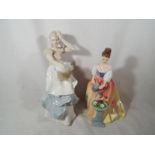 A Royal Doulton Reflections Figurine entitled Breezy Day HN 3162 and a Royal Doulton lady figurine