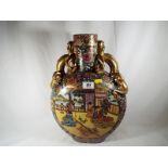 A large Chinese Satsuma Moon flask gilt dragon handles depicting women at play and cats - 41cm.
