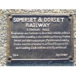 A cast iron sign marked 'Somerset & Dorset Railway company rule . . .