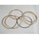 Six 9ct gold bangles, approximate weight 21.