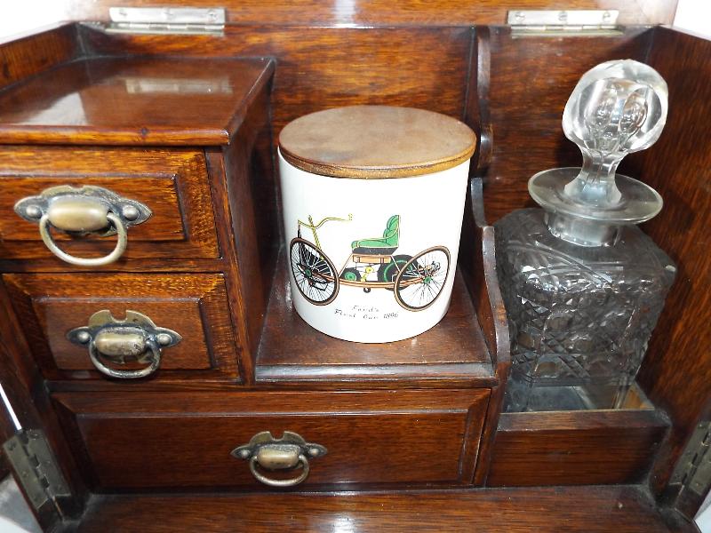 An smoker's oak cased cabinet with presentation plaque dated 1928, - Image 3 of 4