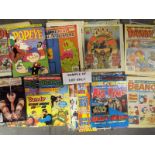 Two boxes containing a large quantity of childrens' annuals,