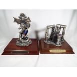Two Myth and Magic pewter figurines on wooden plinths entitled The Dragon of the Underworld 1994