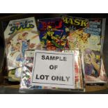 A large collection of comics, magazines,