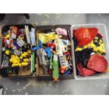 Three boxes of children's toys to include fancy dress outfits, die cast model motor vehicle,