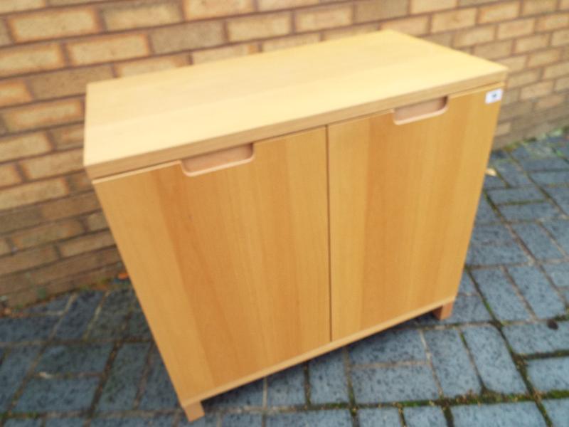 A modern light wood cabinet 74cm (h) x 80cm (w) x 43cm (d)