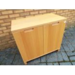 A modern light wood cabinet 74cm (h) x 80cm (w) x 43cm (d)