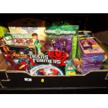 A collection of predominantly sealed blister packs and tins to include Hannah Montana, Ben Ten,